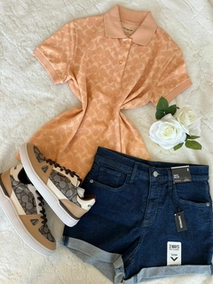 Blusa Coach en internet