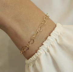 Pulseira Corações Vazados no Dourado - comprar online