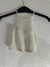 Tops a $5.000