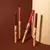 CONTORNO LABIAL RETRÁTIL CHOCO FUN – BOMBOM na internet