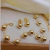 Conjunto Pulsera y Arito Bolitas Enchapado a Oro 18k