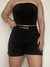 Short negro con broche