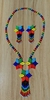 SET COLLAR + ARETES FLORES