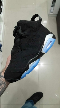 jordan negras con azul 6