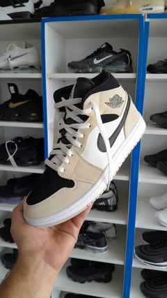 jordan 1 negra y crema