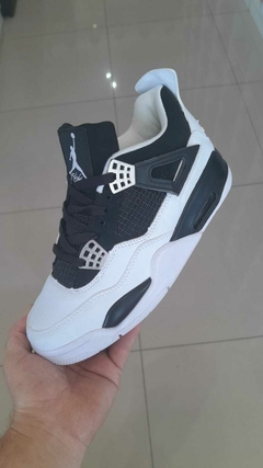 jordan retro 4 blanca con negro