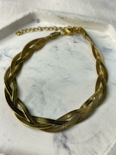 PULSERA TRENZADA ACERO DORADO