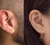Brinco Cruz Vazado - Banhado a ouro 18k