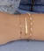 PULSEIRA COM MINI MEDALHAS DE CORAÇÃO - OURO 18K - comprar online