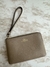 corner zip wristlet Coach en internet