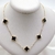 Colar Trevo Aço Inoxidável Dourado - PRETO - comprar online
