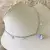Choker de aço inox hipoalergênico, corrente de elo português com extensor, 7 pingentes de coração e 8 zirconias