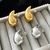 Aretes de gota plateados - comprar en línea