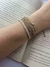 Pulseira em Fio de Seda, Canutilhos e Cristal na internet