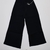 PANTALÓN WIDE LEG NEGRO CON CADENA en internet