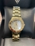 Relógio Guess Dourado na internet