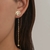 Brinco Rosa com Fio em Aço Inoxidável Dourado - comprar online