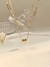 Colar Duplo Catier e Coração 3D em Aço Inoxidável Dourado - loja online