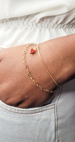 Pulseira elo Coração vermelho - dourada na internet