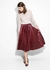 falda plisada eco cuero BORDO