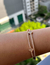 Bracelete duplo insp. trevos cravejados