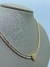 COLAR RIVIERA PEDRA ZIRCONIA BAGUETE COM CORAÇAO CENTRAL LISO POLIDO DOURADO - comprar online