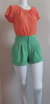 Shorts verde com barra italiana na internet
