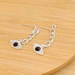 Aros con cadena + dije Ojitos negro con piedras