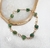 Pulseira luma pedras roladas