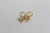 Brinco argola laço banho de ouro 18k