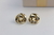 Brinco concha torcida banho ouro 18k