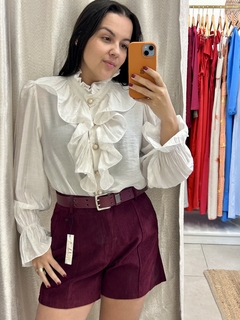 Camisa Poliana na internet