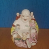 Buda da Fertilidade em porcelana