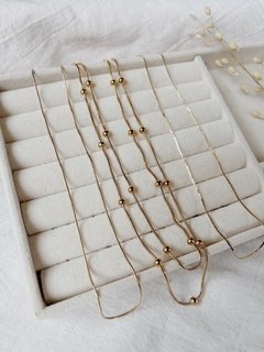 Cadenita Ambar doble, acero dorado en internet