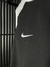 REGATA DRI FIT NIKE BRANCA COM PRETO na internet