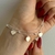 Pulsera doble con corazones rellenos chatitos 460