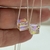 Cadena con dije Swarovski cubo