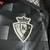 Camisa Osasuna III 24/25 - Torcedor Macron Masculina - Preta com detalhes brancos na internet