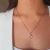 COLAR COM PINGENTE CRAVEJADO EM ZIRCONIAS BELLA BANHO DE RÓDIO - comprar online