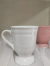Chocolatero vintage con cartel