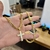 Corrente Grumet 7mm Com Pingente Cruz Relevo M Banhados A Ouro 18k na internet
