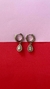 Aros argolla en plata 925 en forma de gota con cubic central y micorpavé alrededor