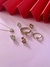 Anillo macizo en oro 18k con piedra central en forma de corazón y piedras cubic