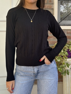 Sweater negro trenzas