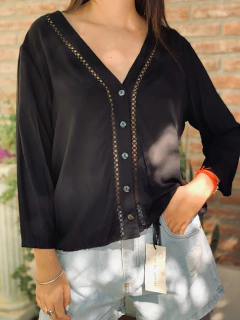 Camisa con detalles