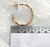 Brinco de Argola em tubo e Detalhes dourado na internet