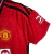 Image of Camisa Manchester United I 23/24 -Torcedor Feminina - Vermelha com detalhes em preto e branco