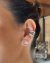 Piercing Triplo Cravejado na internet