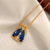 Colar Nossa Senhora Cristal Azul Safira na Veneziana - loja online