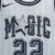 Regata Orlando Magic City Edition Nike 2024/25 com textura de armadura de platina, inscrição Magic gótica e estrela retrô.